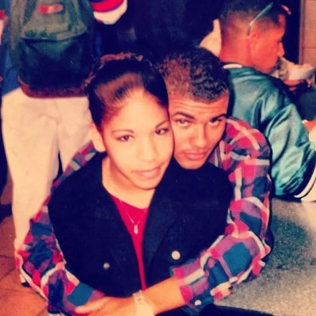Andre Ramone as a teenager with his arms around Sarah, both in plaid, at a school gathering